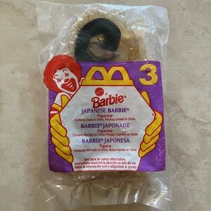 Barbie Collectible Figurine with Pink and Black Outfit